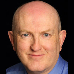 Headshot of man smiling - Fran Brennan